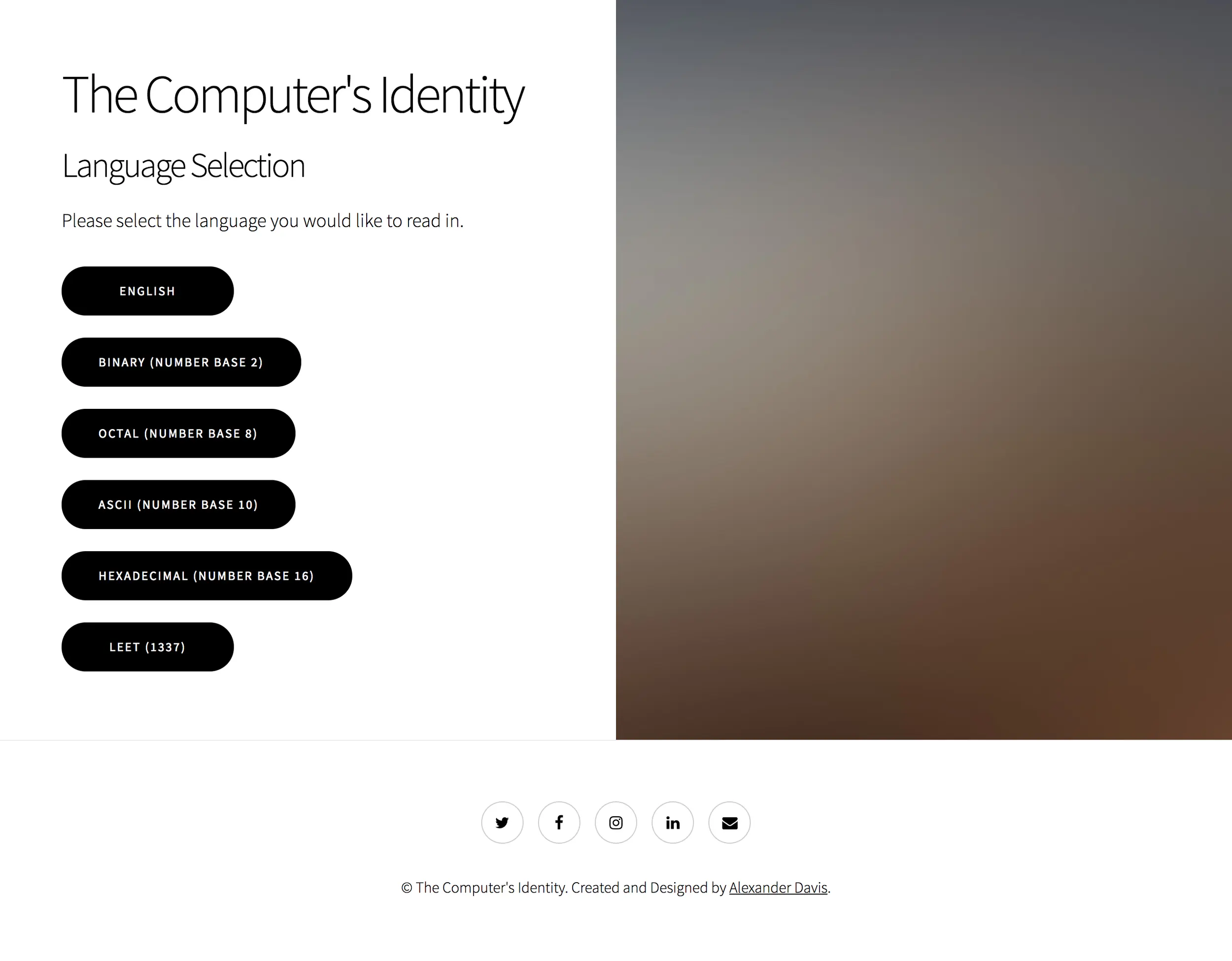 A minimalistic web interface titled “The Computer’s Identity” with a language selection menu offering English, Binary, Octal, ASCII, Hexadecimal, and Leet options. The background on the right is a blurred gradient of brown and grey tones.